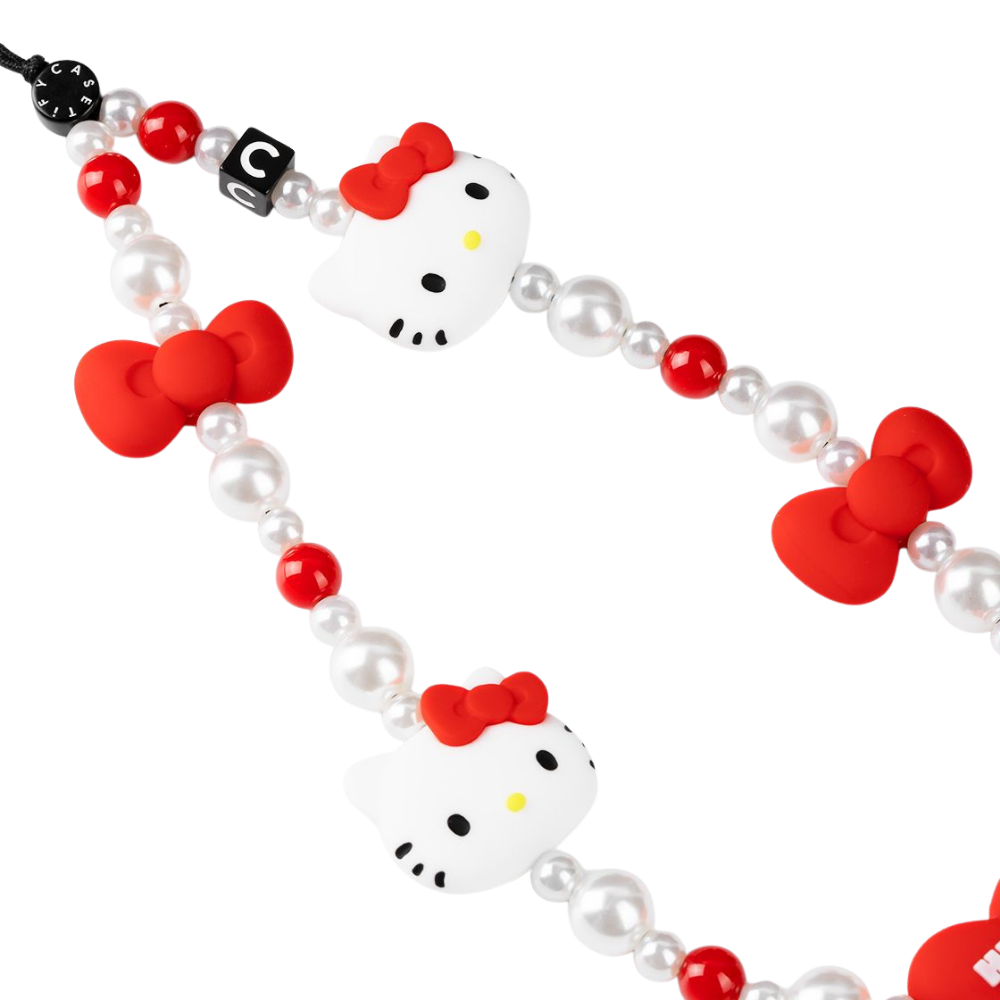 Casetify Strap de Mano Hello Kitty Classic Red detalle - charms Hello Kitty con lazos rojos y cuentas Casetify
