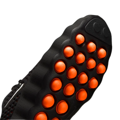 Nike Mind 002 detalle suela - cápsulas de amortiguación naranja alta visibilidad para mejor confort deportivo