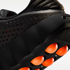 Nike Mind 002 Black Orange detalle lateral - upper perforado con cápsulas naranja amortiguación extrema